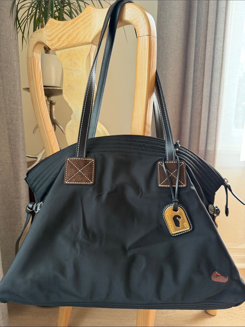 Dooney & Bourke Black Tote Bag with Leather Trim and Pink inside